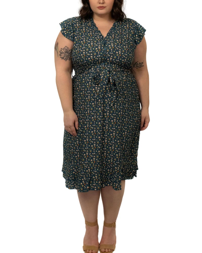 Front of a model wearing a size XL Alma Short Dress V Frilled Neck Ditsy Print Teal in Green by ANNICK. | dia_product_style_image_id:290458